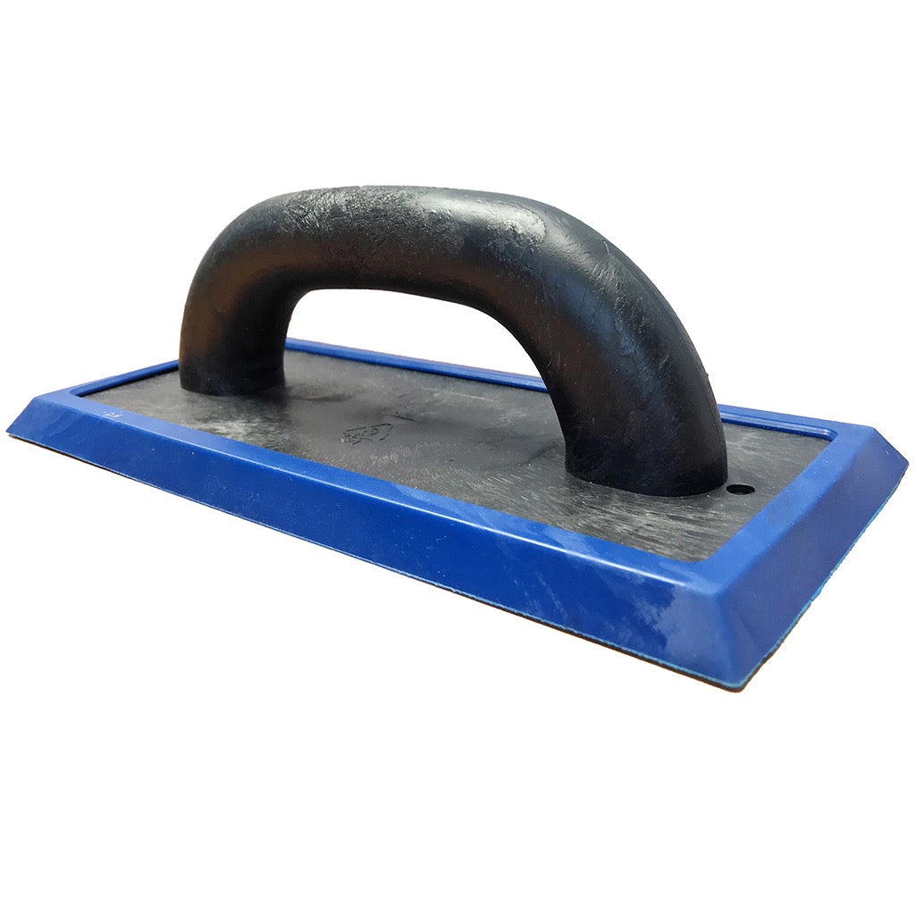 Plastic trowel with rubber base