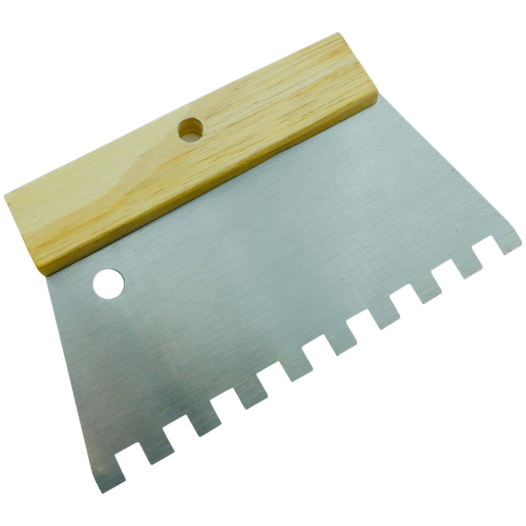 Glue spatula with toothed blade